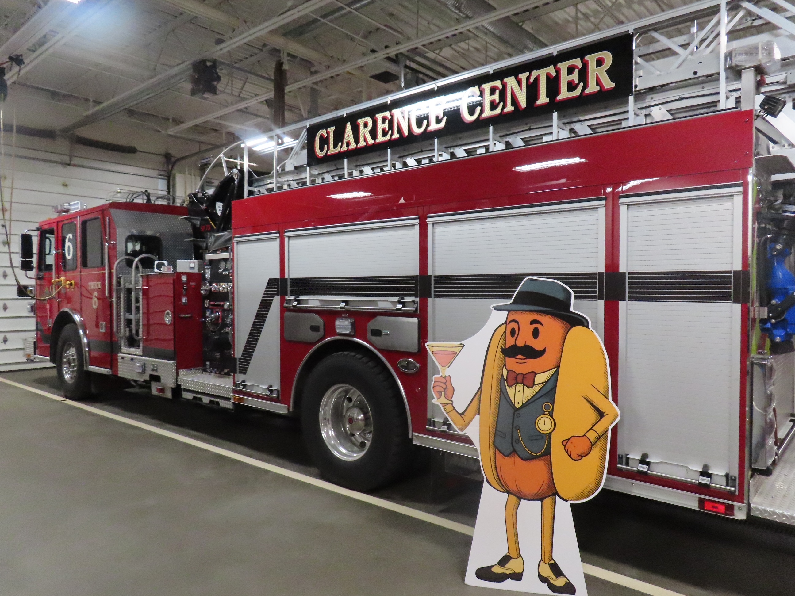 Franklin mascot in front of Clarence Center fire truck